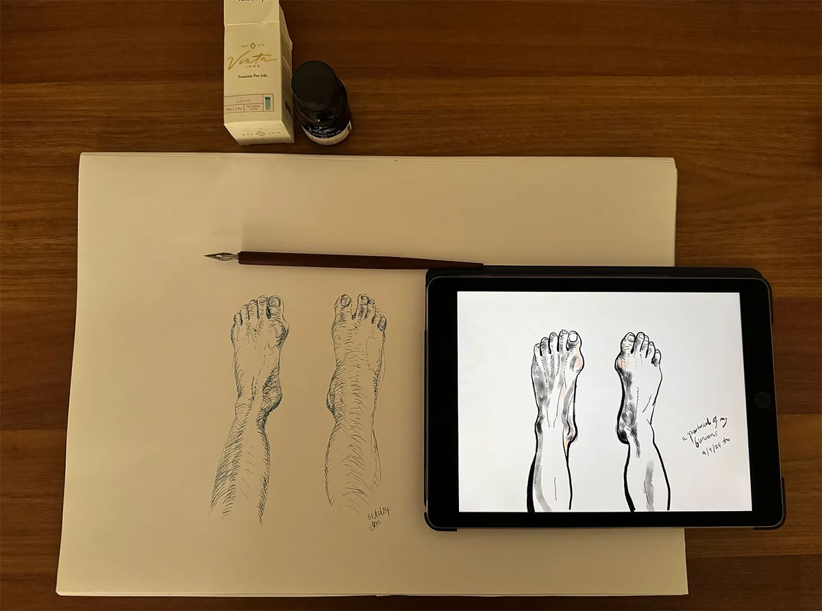 A photo of an artist's workspace, showing both a physical ink drawing and a digital tablet version of an illustration of feet with bunions, along with the art supplies used.